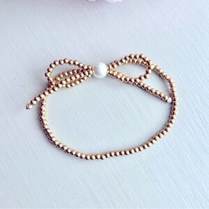 Beaded Stretch Gold Bow & Pearl Bracelet